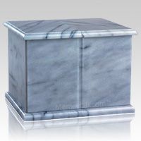 a blue marble box sitting on top of a white floor