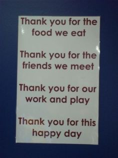 a sign posted on the side of a building saying thank you for the food we eat