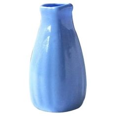 a light blue vase is shown on a white background for use as an accent piece