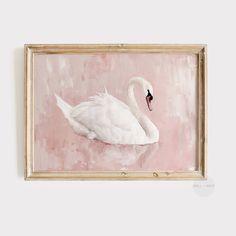 a painting of a white swan is hanging on the wall next to a pink background