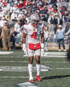 a football player is standing on the field