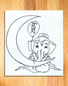 an elephant sitting on top of a wooden floor next to a drawing of the letter e