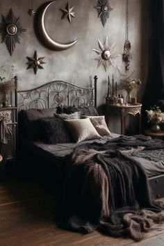 a bed room with a neatly made bed and stars on the wall