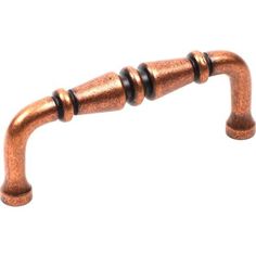 an old fashioned copper colored metal handle on a white background with clipping for text