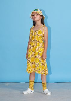 New from Weekend House Kids 'Everything Grows With Love' collection for Spring/Summer 2022. Kid's sunny yellow linen strappy dress with allover mimosa floral print. - Kid's dress - 100% linen - Color: Yellow Mimosa - Round neckline - Sleeveless - Adjustable shoulder ties - Elastic waistband - Flared skirt - Knee length Yellow Mimosa, Corduroy Blouse, House Socks, House Print, Weekend House, Misha And Puff, Yellow Short, Happy House