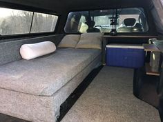 a couch in the back of a van