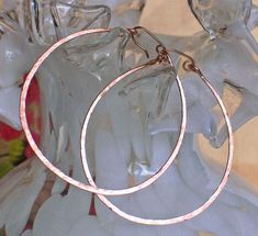 Large 14k rose gold filled hoop earrings. Rose gold filled hoops made with thick hammered wire. Each hoop earring pictured measures 2 1/4 inches wide. Earrings are handmade to order and may vary slightly from pictures. I test drive all my earring designs, they are light weight and very comfortable. Large Hoops available in 14K rose gold filled, 14k yellow gold filled, sterling silver, and smaller sizes. Availavle at BlueWaveJewelry.Etsy.Com Shop more gold filled hoops: https://www.etsy.com/shop/ Hammered Rose Gold Hoop Earrings Gift, Rose Gold Wire Wrapped Hoop Earrings, Rose Gold Hammered Small Hoop Earrings, Rose Gold Hoop Earrings, Earring Designs, Gold Filled Hoops, Test Drive, Gold Hoop, Gold Hoop Earrings