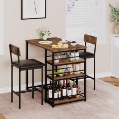 a kitchen table with two chairs and a wine rack on the bottom shelf next to it