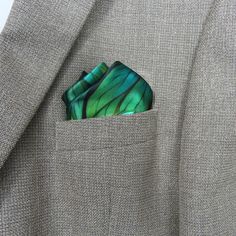 "Generative leaves make a fascinating pattern in vivid green across this 100% silk pocket square. Art-to-wear on very high quality silk satin with a hand-rolled hem.   Add on an optional polyethylene Pocket Square Holder to help with keeping your fancy fold in place! It will be shipped with your pocket square. Keep your look crisp at weddings or events even if you aren't a frequent pocket-square wearer. * Digitally printed original design * 100% silk satin * Approx. 17\" square  * Hand-rolled he Green Pocket Square For Formal Occasions, Classic Green Pocket Square For Business, Green Formal Pocket Square Handkerchief, Formal Green Pocket Square Handkerchief, Green Silk Scarf For Formal Occasions, Formal Green Silk Scarf, Green Pocket Square, Silk Pocket Square, Square Art