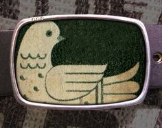 a belt with an image of a bird on it