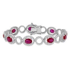 This majestic Oval Ruby & Round Diamond Bracelet is crafted from 18k White Gold (12.10 Ct). It has 9 oval rubys. Allurez universally acclaimed craftsmanship comes second to none; let true luxury be your gift with an Allurez diamond bracelet today! #diamondbracelet #diamondbracelets Oval Ruby Bracelet, Round Diamond Bracelet, Ruby Bracelet, Hand Chain, Diamond Bracelets, Gemstone Bracelets, Tennis Bracelet, Luxury Items, Link Bracelets