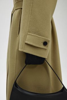 Enjoy unparalleled elegance and warmth with our handcrafted, Italian-finished Luxe Silk Wool Cashmere Coat. Classic Silk Outerwear With Pockets, Silk Outerwear With Pockets And Lapel Collar, Silk Outerwear With Lapel Collar And Pockets, Elegant Silk Outerwear With Concealed Placket, Elegant Single Breasted Khaki Outerwear, Elegant Single-breasted Khaki Outerwear, Elegant Khaki Outerwear With Lapel Collar, Fall Silk Outerwear With Button Closure, Elegant Beige Outerwear With Button Cuffs