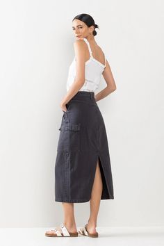 CARGO MIDI SKIRT WITH POCKETS IN DARK GREY Based on photo. Model is 5'11" and is wearing a size S78% COTTON, 22% RAYONColor: SP-S7521DGWaist: 29"Front Center Length: 33"Side Length: 34"Imported Cotton Midi Skirt With Pockets, High Waist Cargo Skirt With Pockets For Day Out, Cotton Cargo Skirt With Pockets For Day Out, High Rise Cotton Skirt With Side Pockets, Crop Top Jumpsuit, Cargo Midi Skirt, Midi Skirt With Pockets, Photo Model, Skirt With Pockets