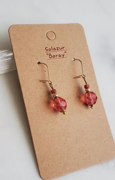 Solazur earrings "Boray" --- Modern. Comfortable. Joyful. So beautiful and so dainty earrings, made to add joy and style to your outfit. Lightweight, you forget you have them on. Hypoallergenic.  Made in three colors to coose from, each pair has its own pop of color and gorgeous shine.  ◇golden brown amber tone ◇ocean aqua tone ◇strawberry pink tone Perfect summer accessory, elegant and charming. Earrings are made with 14K gold filled wire and high quality European made glass and accent beads. S Wire Wrapped Drop Crystal Earrings For Gift, Wire Wrapped Drop Crystal Earrings As Gift, Hypoallergenic Czech Glass Beaded Earrings For Gift, Hypoallergenic Czech Glass Earrings For Gift, Dainty Nickel-free Crystal Earrings For Gift, Party Czech Glass Crystal Earrings With Ear Wire, Dainty Nickel-free Crystal Earrings As Gift, Dainty Nickel-free Beaded Earrings For Gifts, Dainty Crystal Drop Earrings For Gift