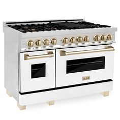 a white stove with two ovens and gold knobs on the front, against a white background