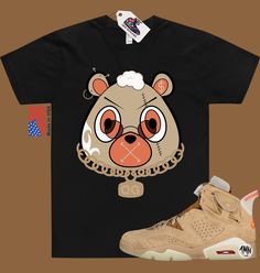 a t - shirt with an image of a bear on it and a pair of sneakers