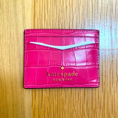 Kate Spade Staci Small Slim Card Holder Perfect For Holding Just The Essentials! 3.94" W X 2.8" H X 0.4" D Saffiano Leather Ksny Metal Pinmount Logo Two Way Spade Jacquard Lining Exterior: 6 Credit Card Slots, Open Middle Compartment *Check Out My Listings For The Matching Purse! Pink Rectangular Card Holder For Formal Use, Formal Pink Card Holder With Card Slots, Luxury Kate Spade Wallets With Card Slots, Elegant Pink Wallets With Rfid Blocking, Trendy Kate Spade Wallet With Card Slots, Trendy Kate Spade Wallets With Card Slots, Kate Spade Rectangular Card Holder With Card Slots, Kate Spade Card Holder For Everyday Use, Formal Pink Kate Spade Wallets