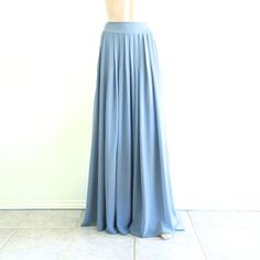 Blue Flowy Maxi Skirt With Elastic Waistband, Blue Maxi Length Party Bottoms, Flowy Blue Maxi Skirt With Gathered Details, Elegant Blue Maxi Skirt, Flowy Blue Maxi Bottoms, Fitted Chiffon Pleated Bottoms, Chic Blue Full Length Maxi Skirt, Chic Blue Full-length Maxi Skirt, Blue Maxi Length Bottoms For Party