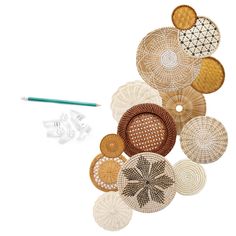 an assortment of woven objects are displayed on a white background