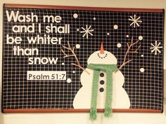 a snowman wearing a green hat and scarf next to a sign that says, wash me and i shall be winter than snow