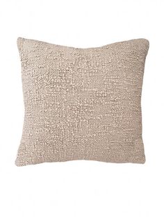 a beige pillow on a white background