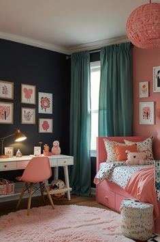 a pink and blue bedroom with pictures on the wall