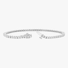 Named after women’s tennis champion Chris Evert, who lost a similar style on the 1987 US Open court, this flexible, close-set diamond bracelet comes adorned with a securely designed clasp that fluidly moves with every gesture (so it’ll stay with you forever). A perennial classic in every era, the single strand looks radiant alone for 1.8-carats of delicate sparkle and layers with other styles for a more subdued shimmer. Custom sizes are available upon request. Presented in our signature Noémie o Chris Evert, Tennis Champion, Diamond Tennis Bracelet, Diamond Charm, Us Open, Tennis Bracelet Diamond, Lab Created Diamonds, Tennis Bracelet, Quality Diamonds