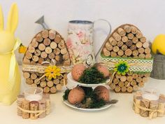 some wine corks are sitting on a table with other decorations and decorating items