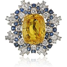 Immerse yourself in the timeless elegance of this exquisite Oscar Heyman 1970's Platinum & 18K Yellow Gold Yellow Sapphire & Diamond Brooch. With a captivating design and exceptional craftsmanship, this brooch is a true testament to the brand's legacy in the world of fine jewelry.Crafted with meticulous attention to detail, this brooch showcases a dazzling display of yellow sapphires and diamonds. The 31.97 carats total weight of yellow sapphires adds a vibrant burst of color, while the 6.09 car Luxury Yellow Gold Brooch Jewelry, Luxury Yellow Gold Sapphire Jewelry, Luxury Yellow Gold Gemstone Brooch, Formal Yellow Gold Diamond Brooch, Luxury Yellow Gold Brooches With Gemstones, Luxury Yellow Gold Gemstone Brooches, Formal Yellow Gold Multi-stone Brooches, Formal Yellow Gold Diamond Brooches, Yellow Gold Diamond Brooches For Formal Occasions