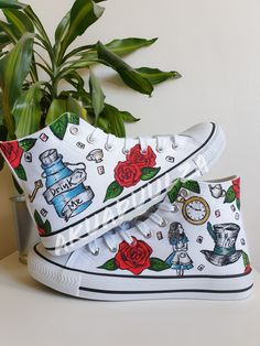 "🌹-ALICE IN WONDERLAND DESIGN-🌹 🌈DESCRIPTION: You will receive a unique pair of shoes which I will personally paint by hand just for you.  I create your shoes from scratch by hand in my little studio. The main design is painted on the outside of the shoes only, while on the inside the shoes are painted with some green leaves to match with the outside. 🔥UNIQUE: As the shoes are PAINTED BY HAND, the design may slightly vary from the picture. Each design is unique in its own way. 🎨CUSTOMISE THEM: As the shoes are made to order, feel free to make them even more unique. In fact it is possible to customise them, adding a text, a date or a name on the inside of the shoes or even in the corner, on the outside next to the characters. Simply leave me a note at the checkout with the details you Alice In Wonderland Shoes, Roses Illustration, Wonderland Design, Alice In Wonderland Inspired, Custom Painted Shoes, Wonderland Theme, Rose Illustration, Hand Painted Shoes, Mad Hatter Tea