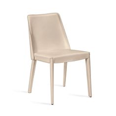 a white chair sitting on top of a white floor