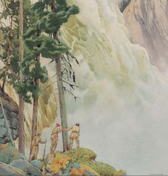 two men standing in front of a waterfall with trees on the side and rocks below