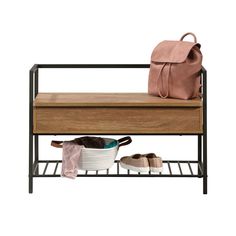 a wooden bench with shoes on it and a bag hanging from the shelf above it