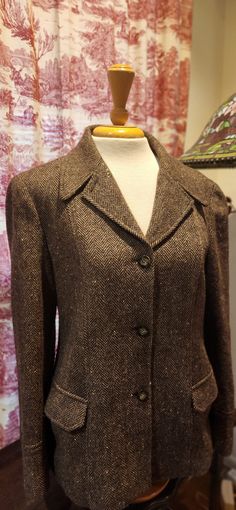 Beautiful vintage 1980s Herringbone Tweed Anne Klein jacket in Size 8 - Made in Hong Kong. Patch pockets on front, princess seamed style and button front. Wool Blazer With Covered Buttons For Fall, Fall Wool Blazer With Covered Buttons, Vintage Button-up Tweed Jacket For Fall, Vintage Tweed Long Sleeve Jacket, Vintage Fall Blazer With Covered Buttons, Classic Fall Blazer With Covered Buttons, Notch Lapel Blazer With Covered Buttons For Fall, Fall Notch Lapel Blazer With Covered Buttons, Vintage Wool Tweed Jacket With Button Closure