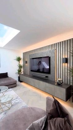 a living room with a large flat screen tv