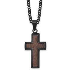 a wooden cross on a black chain with an oxen finish is shown in this image