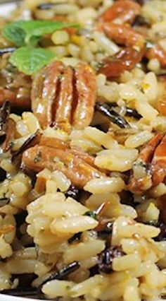 rice with nuts and herbs in a white bowl