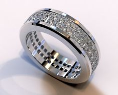 a white gold ring with rows of diamonds