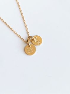 14k Gold Initial with 14k solid gold cable chain , rope chain and box chain. This is a super, super cute necklace. It's is very simple and perfect with any outfit . This listing for One initial disc and one heart charm in 14k gold chain . All components onto 14k solid gold. If you want to add initial or heart charm , please let me know . This beautiful necklace consists of... -6mm 14k solid Initial disc, -14k real Solid gold chain , -Come up with beautiful ribbon gift box and -One set of Care in Adjustable Yellow Gold Charm Necklace With Coin Pendant, Adjustable 14k Gold Charm Necklace With Round Pendant, Yellow Gold Coin Pendant Dangle Jewelry, Yellow Gold Dangle Jewelry With Coin Pendant, Yellow Gold Dangle Coin Pendant Jewelry, Minimalist Yellow Gold Coin Necklace With Initial Pendant, Minimalist Yellow Gold Initial Pendant Coin Necklace, 14k Gold Round Disc Charm Necklace, Dainty 14k Gold Round Disc Charm Necklace