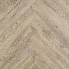 an image of wood flooring that looks like herringbones