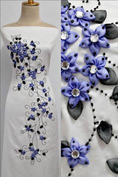 a white dress with blue flowers on it and a mannequin wearing black beads