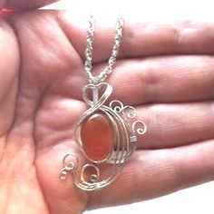 This vibrant red carnelian womans pendant necklace jewelry is wire wrapped in silver and entirely handmade by me and includes free shipping. Please note that the item pictured is a sample only, yours will be the same color, size and shape but there will be some natural variations. This is Handmade Carnelian Jewelry For Gifts, Handmade Carnelian Jewelry As A Gift, Artisan Carnelian Jewelry As A Gift, Artisan Carnelian Jewelry As Gift, Hand Wrapped Carnelian Necklace For Gifts, Handmade Carnelian Jewelry Gift, Artisan Carnelian Jewelry For Gift, Hand Wrapped Orange Jewelry Gift, Hand Wrapped Orange Jewelry For Gift