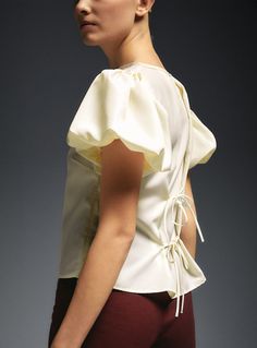 Structured taffeta cropped blouse with round neckline. Balloon sleeves. Featuring two bows closure on the back. Invisible side zip fastening. Model Sketch, Blouse Sale, Cropped Blouse, Indian Traditional, Puff Sleeve Blouse, Puffy Sleeves, Crop Blouse, Balloon Sleeves, Design Inspo