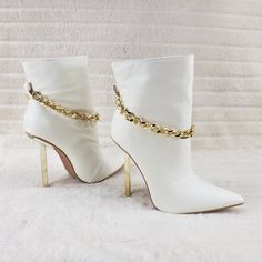 New In Box Pointy Toe Design With Spike Gold Tone 4.5" Heel And Removable Chain Detail Soft To The Touch Vegan Leather Gold Tone Hardware Sexy Us Woman's - Runs True To Cape Robbin Sizes White High Heel Boots For Party, White Pointed Toe Heeled Boots For Evening, Chic Cream Heeled Boots For Party, Trendy White High Heel Boots, Trendy White Boots For A Night Out, Chic White Heeled Boots For Formal Occasions, White Heels With Metal Feet, Cream High Heel Party Boots, White Ankle-high Heeled Boots For Party