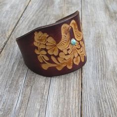 Made from top quality Italian vegetable tanned leather.Hand painted, embossed.Cuff is 2,1 inches (5,5 cm) wideAdjustable Size approx between 15 and 18 cmPlease measure carefully your wrist and select the most preferable size!If you need a diferent size, please let me know after purchase in "note for seller".Please visit to my another shop:https://www.etsy.com/shop/JeansBelt?ref=hdr_shop_menu**************************************************************************FEDEX to USA and Australia!If yo Rustic Turquoise Leather Bracelet, Vintage Hand-tooled Leather Cuff Bracelet, Artisan Turquoise Leather Cuff Bracelet, Vintage Hand Tooled Cuff Bracelet For Festivals, Vintage Hand-tooled Cuff Bracelet For Festivals, Turquoise Hand Tooled Leather Cuff Bracelet, Turquoise Leather Cuff Bracelet Hand Tooled, Vintage Hand Tooled Cuff Leather Bracelet, Vintage Hand Tooled Leather Cuff Bracelet