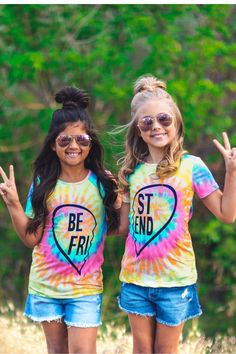 RUNS A LITTLE BIG, IF IN BETWEEN SIZES WE SUGGEST SIZING DOWN *Each top sold separately* Trendy tie dye print Short sleeve design makes it a perfect pick all year round Left side says "BE FRI" right side says "ST END" Ultra soft material for comfort & ease These Tie Dye "Best Friends" Top features short sleeves, and a bff saying embossed on the front. In a versatile tie dye color, this top is made from soft and breathable fabric that will keep her comfy during all adventures. She can pair it wit Girl Scout Shirts, Sparkle In Pink, Tie Dye Techniques, Tie Dye Colors, Tie Dye Shirts, Tie Dye Designs, Tie Dye Print, Childrens Fashion, Sleeve Designs