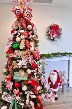 a christmas tree decorated with candy canes and ornaments