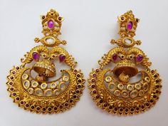 Look more beautiful with this big but lightweight brass base metal with high quality gold antique plated chandbali earrings which is studded with semiprecious stones. Polish and stones are guaranteed. Length - 2 3/4 inches Width - 2 inches AWG - 22 Weight of one earring - 20 grams Gift box packing with extra golden push backs for earrings. Jewelry care instructions : 1. Keep jewelry away from direct heat,water,perfumes,deodorants and other strong chemicals. 2. Any moisture or sweat should be pro Pearl Gifts, Chandbali Earrings, Earrings Indian, Antique Plates, Bollywood Jewelry, Jewelry Pearl, Jewelry Care Instructions, Box Packing, Jewelry Beads