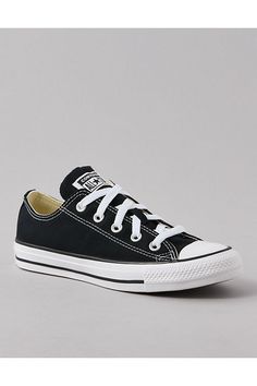 Cotton canvas upper/Round toe/Lace-up silhouette/OrthoLite cushioning/Iconic All Star tongue label/Diamond pattern rubber outsole Mid Top Converse, Black Converse Low, Converse Low, White Jeans Men, Converse Low Tops, Aerie Bras, Athletic Fit Jeans, Black Converse, Mid Top