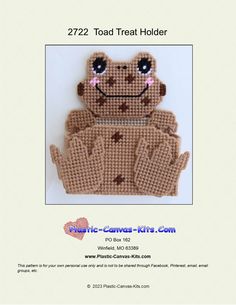 a crocheted stuffed animal with big eyes and hands on it's back